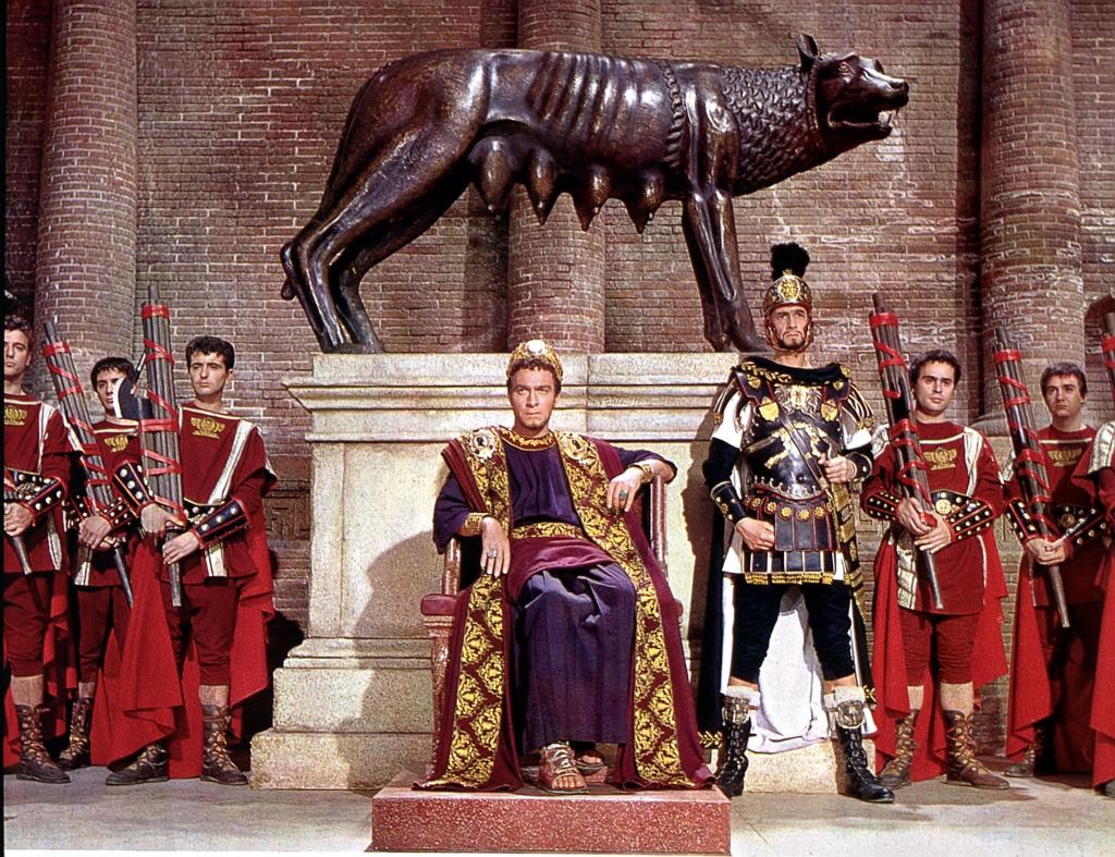 Oscar adayı, epik bir Amerikan yapımı. Roma İmparatorluğu’nun filozof imparatoru Marcus Aurelius (Alec Guinness), imparatorluk eyaletlerinin orduları ile birlikte, Alman ordusuna karşı savaştadır. Artık çok yaşlandığı için tahtını oğluna bırakmalıdır. Ancak kızı Lucilla’ya (Sophia Loren), tahtını en güvendiği komutanı Livius’a (Stephen Boyd) bırakacağını açıklar. Livius’a aşık olan Lucilla için bu durum sevindirici bir haberdir. Ancak Marcus’un oğlu ile kardeş kadar yakın olan Livius, bu teklif karşısında çekimser davranır.